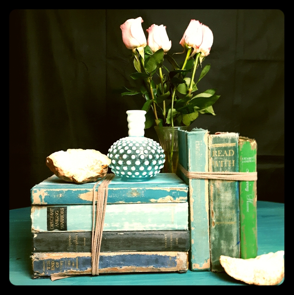 Farmhouse style shabby chic antiqued book stack